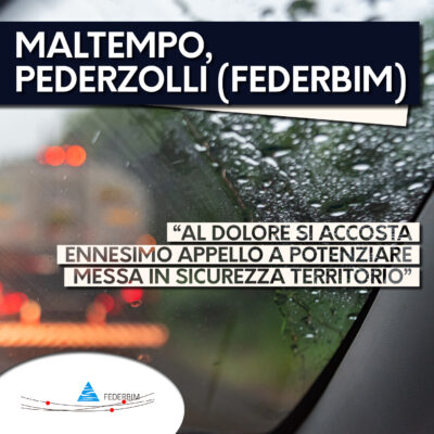 Maltempo Federbim alluvione Marche pioggia su parabrezza auto